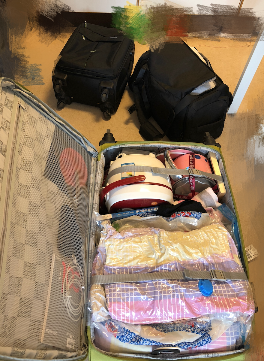 20180302.jpg Packed suitcases