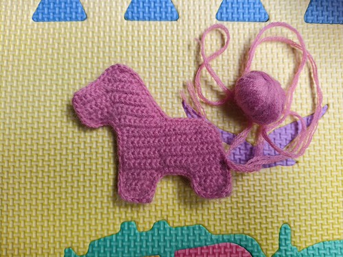 Crocheted pony body and head pieces